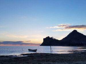 sea in a sunset|Group photo|Tipis|Children's center|Agua es vida|Witch market|Kallawaya ceremony fire|Joe smelling herbs|LA Paz city pic|Breakfast view|Child center|Equine Therapy Center|Factory tour|Cholitas|Group pic in Bolivia|Kallawaya offering|Joe and Jess tall grass|Sunset